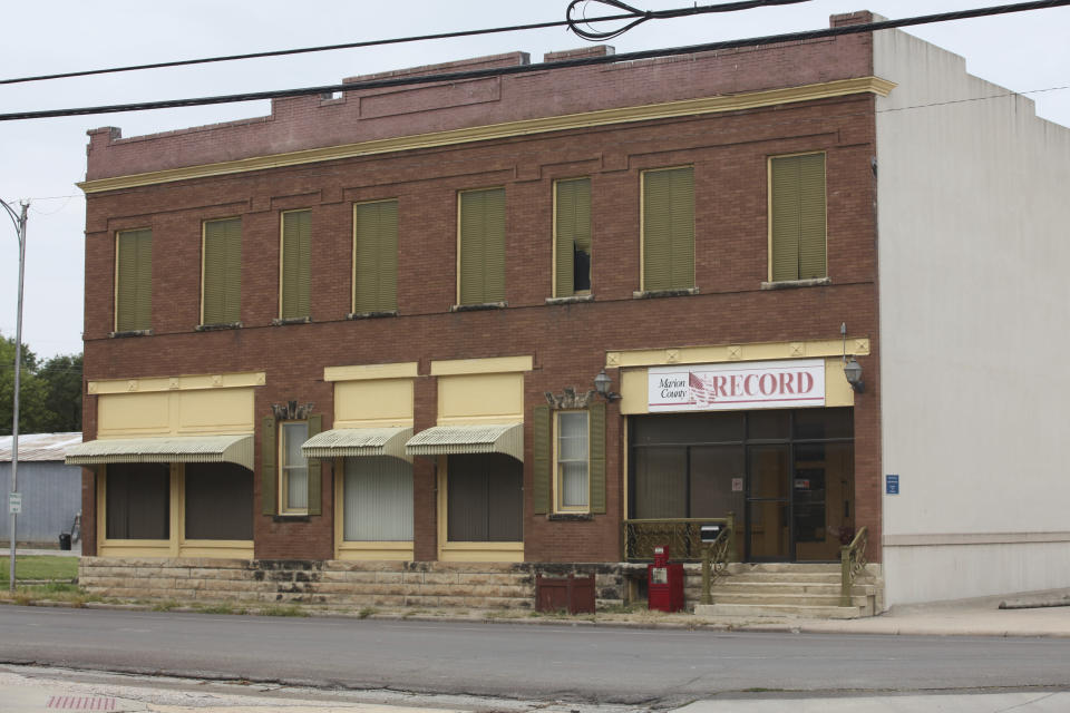 The offices of the Marion County Record sit across from the Marion County Courthouse in Marion, Kan., Sunday, Aug. 13, 2023, in Marion, Kansas. Law enforcement officers raided the newspaper office and seized computers and employee cell phones in what Editor and Publisher Eric Meyer believes is an attempt to intimidate the newspaper as it examines local issues, including the police chief's background. (AP Photo/John Hanna)