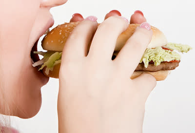 <div class="caption-credit"> Photo by: Thinkstock</div><b>FAT HABIT #14: Taking big bites</b> <br> The American Journal of Clinical Nutrition found that people who took large bites of food consumed 52 percent more calories in one sitting than those who took small bites and chewed longer. By cutting food into smaller pieces, you can increase satiety and enjoy your food more thoroughly. A good general rule? The smaller your bites, the thinner your waistline.<b><br></b> <p> <b><a rel="nofollow noopener" href="http://wp.me/p1rIBL-16U" target="_blank" data-ylk="slk:Too Busy to Eat Healthy?;elm:context_link;itc:0;sec:content-canvas" class="link ">Too Busy to Eat Healthy?</a> Here Are Some Tips</b> </p> <br>