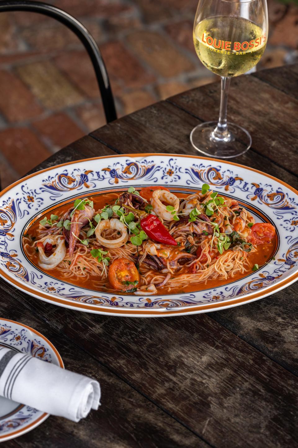 Let dad indulge with the cappellini e calamari with angel hair, calamari, san marzano sauce and calabrian chili peppers at Louie Bossi's in Boca Raton this Father's Day.