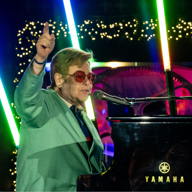 Elton John Performs at Saks Holiday Window Unveiling