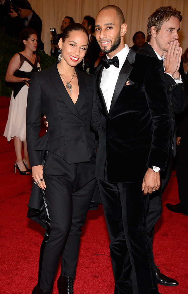  <p class="MsoNoSpacing">Married duo Alicia Keys and producer Swizz Beatz looked near-identical in matching black suits – except he accessorized with a bow tie; she with a pendant necklace.</p>