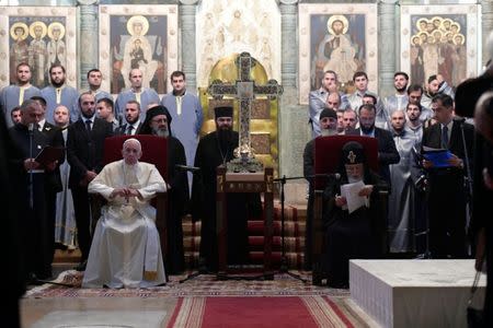 Pope Francis sits next to Georgian Orthodox Patriarch Ilia II during a visit at the Svetitskhoveli Cathedral in Mtskheta, Georgia, October 1, 2016. REUTERS/Osservatore Romano/Handout via Reuters