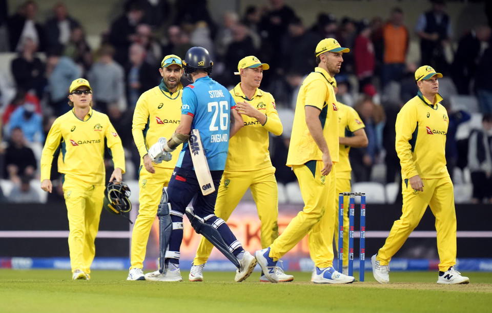 Australia players celebrate the win.