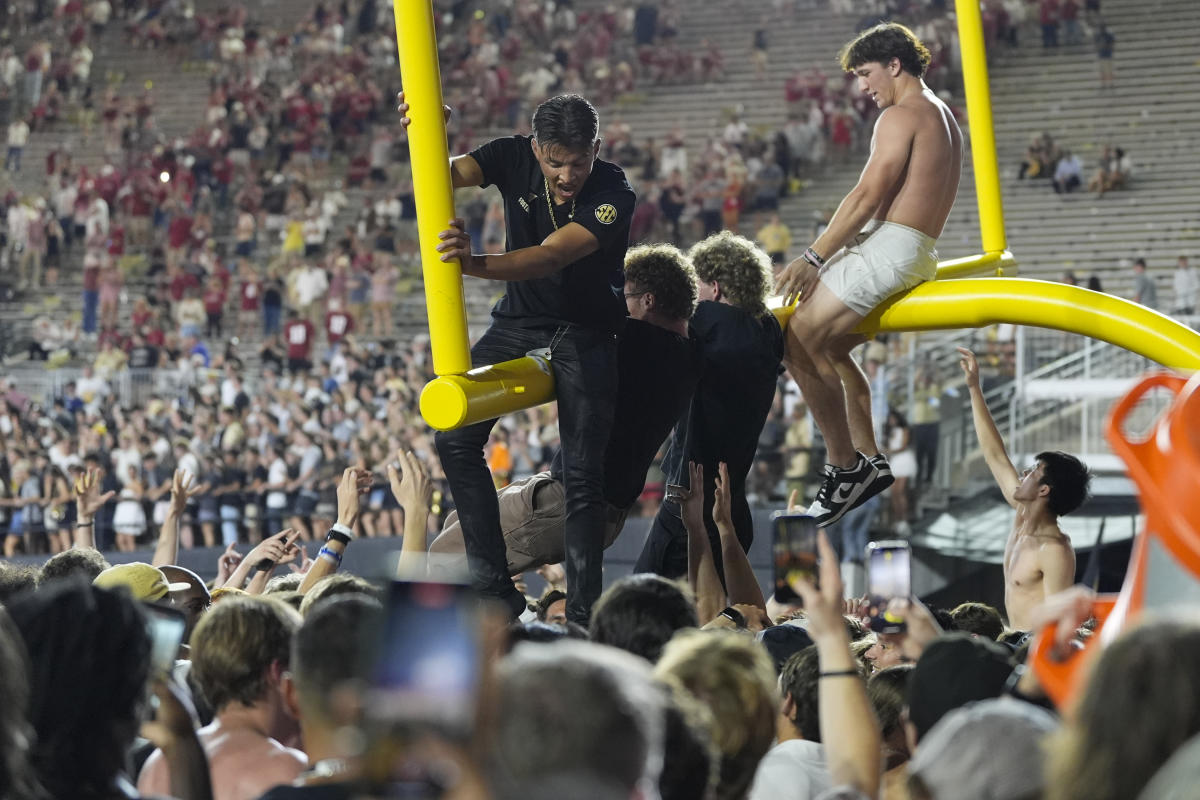 Vanderbilt and Arkansas receive six-figure fines after fans storm the field in upset wins