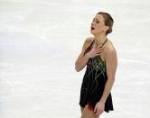 <p>Figure skater Joannie Rochette’s mother died two days before the figure skating competition began in the 2010 Vancouver Games. Rochette’s near flawless performance landed her the bronze medal, and went on to live as one of the most emotional moments in Olympic history. (Getty) </p>