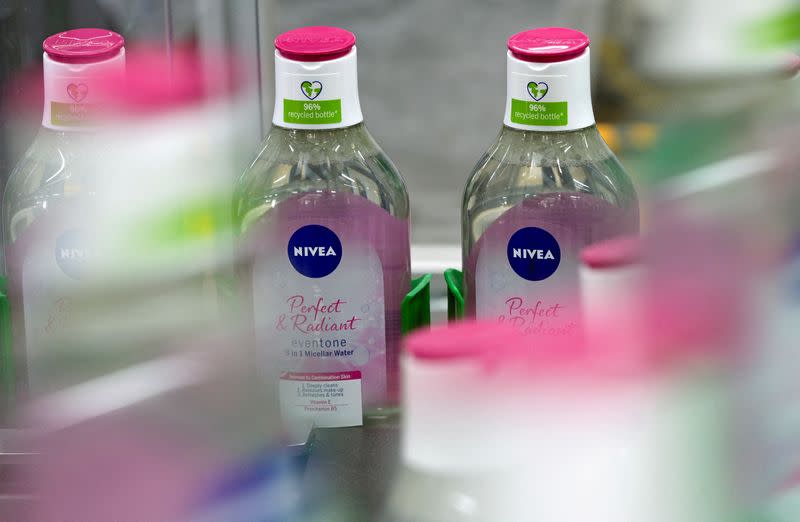 FILE PHOTO: Nivea bottles are seen on a production line at the plant of German personal care company Beiersdorf in Hamburg