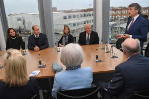 CEO of Jaguar Land Rover Ralf Speth (right) speaking with Kate Middleton and Prince William