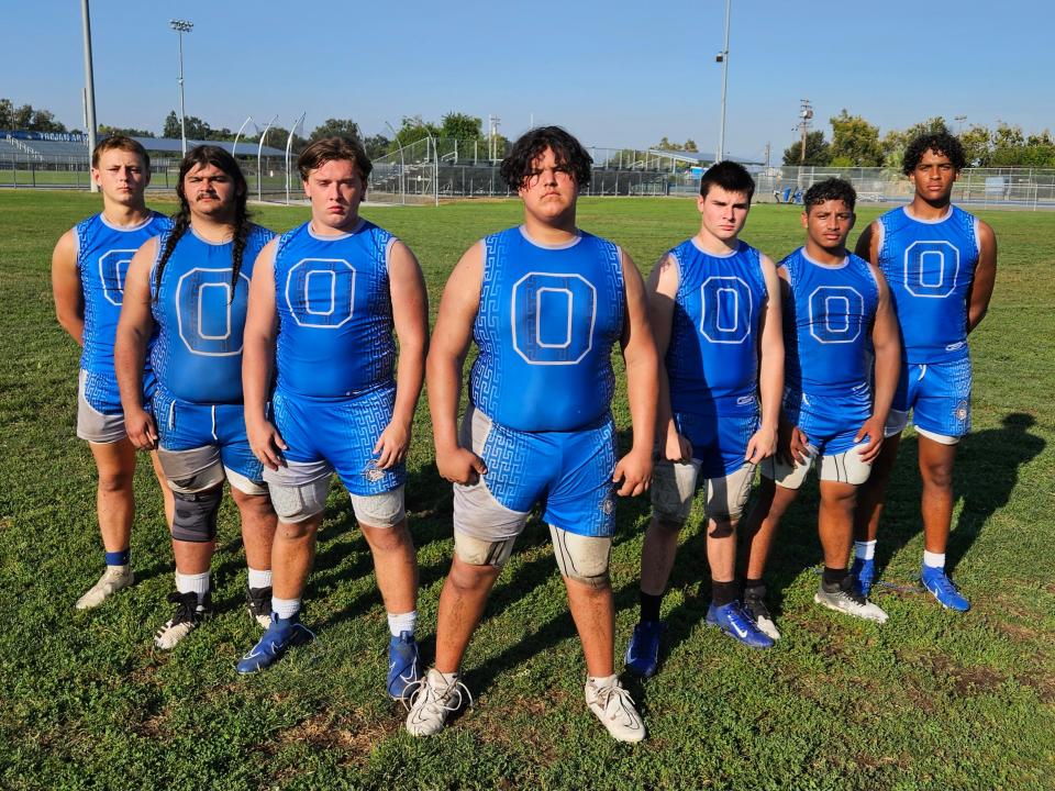 Orland offensive linemen from left to right featuring senior Connor Ovard, senior AJ Fonseca, senior Jeremy Robbins, A J Schekerynec, Grady Lloyd, Angel Ayona and Khalil Coley.