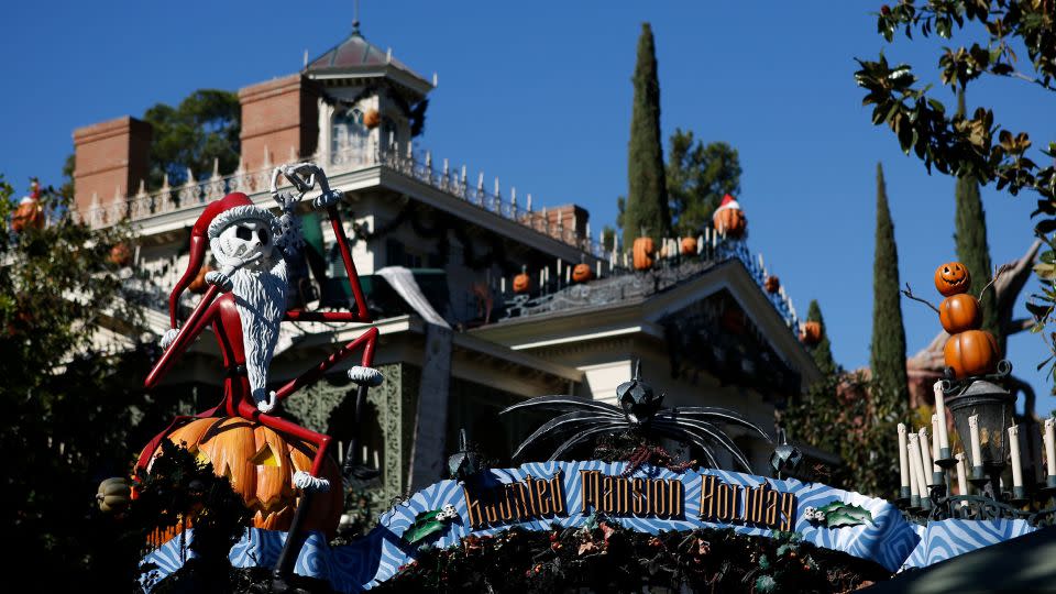 Disneyland's Haunted Mansion attraction is dressed up from Halloween to Christmas with characters from "The Nightmare Before Christmas." - Patrick Fallon/Bloomberg/Getty Images