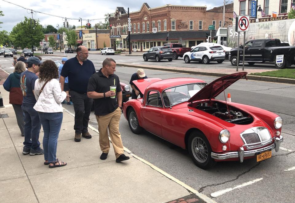 The 1958 red MG A Coupe owned by Susan and Paul Wegman was a hit.