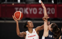 Canada's Kayla Alexander (14), left, shoots over South Korea's Danbi Kim (23) during women's basketball preliminary round game at the 2020 Summer Olympics, Thursday, July 29, 2021, in Saitama, Japan. (AP Photo/Charlie Neibergall)