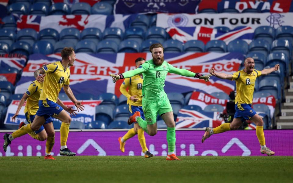 St Johnstone goalkeeper Zander Clark celebrates after his header comes off team-mate Christopher Kane - PA