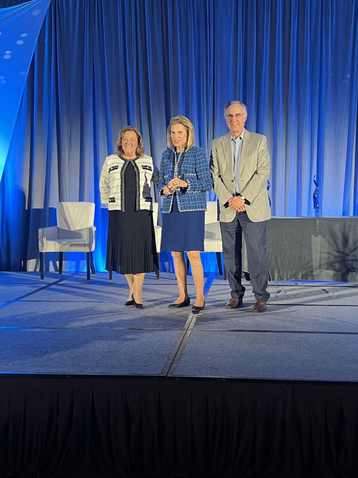 Florida Blue Foundation Executive Director Susan Towler, from left, Promise Fund of Florida co-founder Nancy G. Brinker and Charles Joseph, executive vice president, corporate affairs and chief legal officer at Florida Blue/GuideWell at the Florida Blue Sapphire Award Ceremony in Orlando.