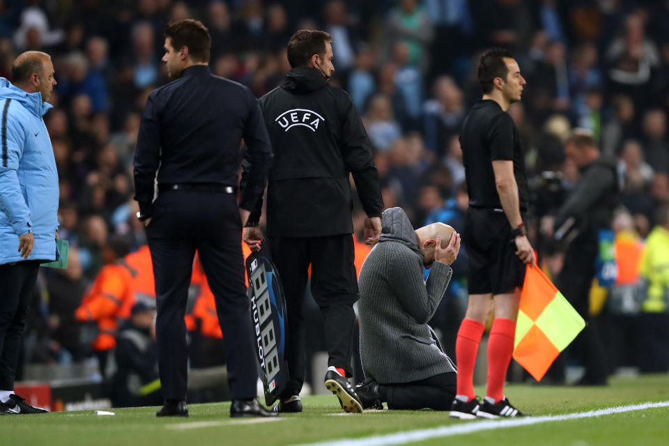 MANCHESTER, ENGLAND - APRIL 17:  Pep Guardiola manager of Manchester City looks dejected in front of the match officials and Mauricio Pochettino manager / head coach of Tottenham Hotspur as a goal is ruled out via a VAR decision during the UEFA Champions League Quarter Final second leg match between Manchester City and Tottenham Hotspur at at Etihad Stadium on April 17, 2019 in Manchester, England. (Photo by Marc Atkins/Getty Images)