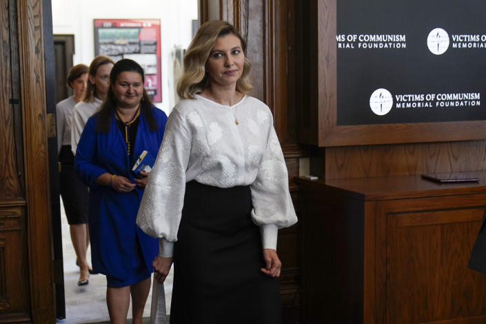 Olena Zelenska, spouse of Ukrainian's President Volodymyr Zelenskyy, followed but Ukraine's Ambassador to the United States, Oksana Markarova, arrives to accept the Dissident Human Rights Award on behalf of the people of Ukraine for their brave fight against Russia at the Victims of Communism Museum in Washington, Tuesday, July 19, 2022. (AP Photo/Carolyn Kaster)