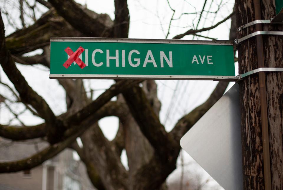 A Michigan Avenue sign in the Harrison West neighborhood of Columbus has the M crossed out with a red X.