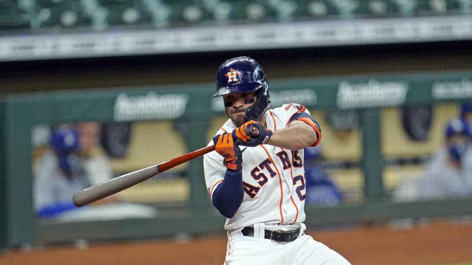 Houston Astros' Jose Altuve bats against the Los Angeles Dodgers during the third inning of a baseball game Wednesday, July 29, 2020, in Houston. (AP Photo/David J. Phillip)