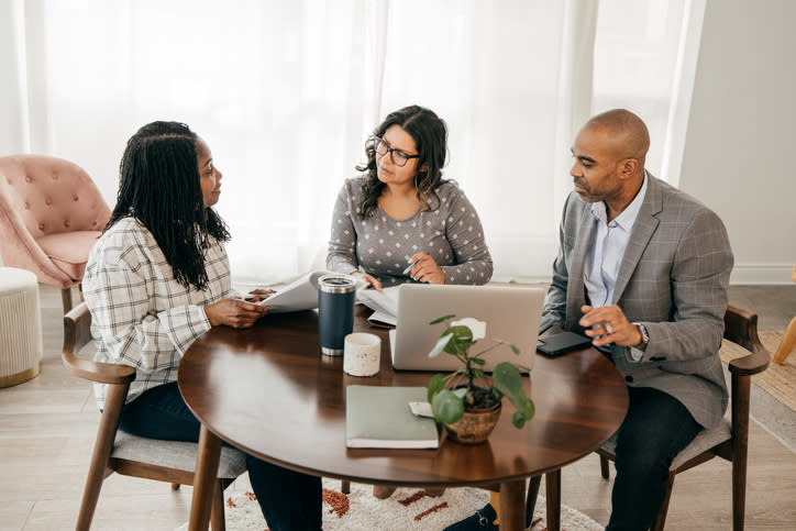 Clients setting up a guardianship with an advisor.