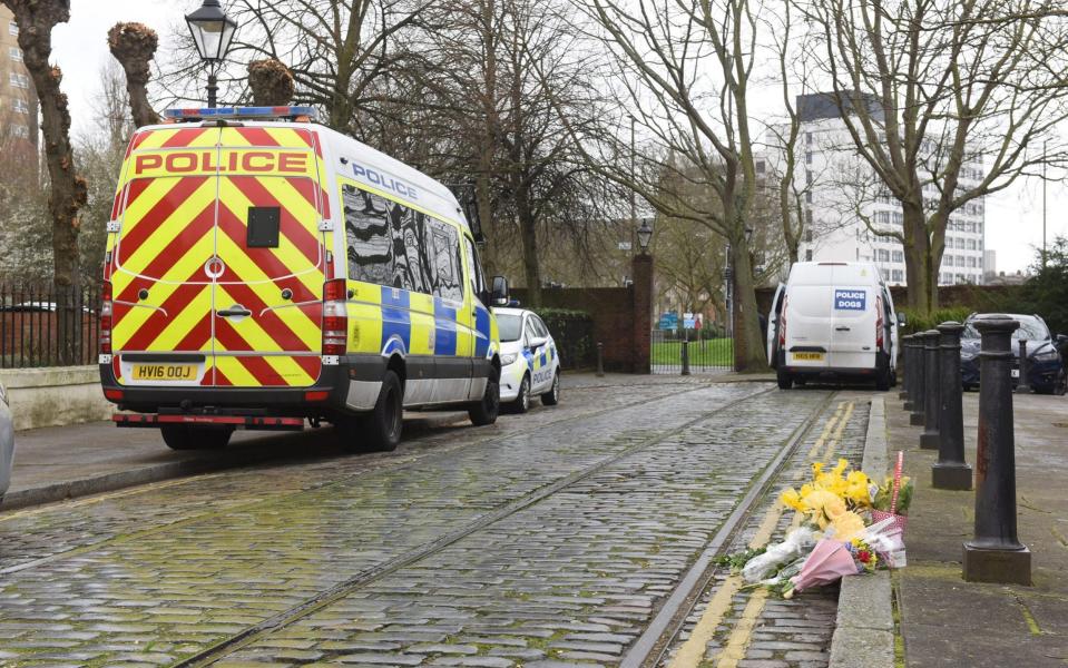 Flowers were left at the scene where the baby's body was discovered yesterday morning. - Solent News & Photo Agency