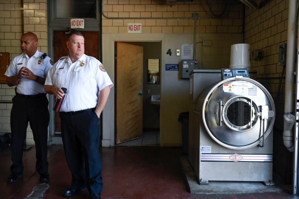 BJ Horton, Fire Chief, and Tristan Johnson, Division Chief of Administration, inside Fire Station 4 during a tour of the facility in Greenville, S.C., on Wednesday, May 10, 2023.