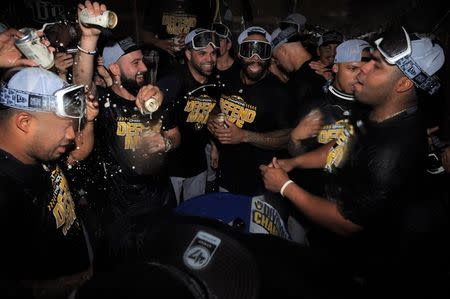 Oct 1, 2018; Chicago, IL, USA; The Milwaukee Brewers celebrate after defeating the Chicago Cubs in the National League Central division tiebreaker game at Wrigley Field. Mandatory Credit: Patrick Gorski-USA TODAY Sports