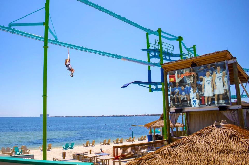 Laguna's Beach Bar + Grill welcomed the largest zip line in Northwest Florida this month overlooking the Santa Rosa Sound.