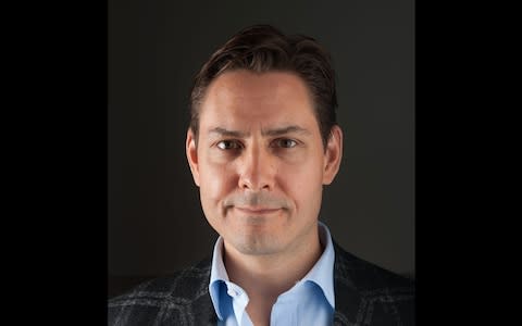 Former Canadian diplomat Michael Kovrig has also been detained in China - Credit: Julie David de Lossy/AFP