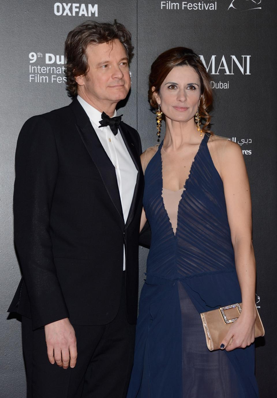 DUBAI, UNITED ARAB EMIRATES - DECEMBER 14: Actor Colin Firth with his wife Livia attend the 2012 Dubai International Film Festival, Dubai Cares and Oxfam "One Night to Change Lives" Charity Gala at the Armani Hotel on December 14, 2012 in Dubai, United Arab Emirates. (Photo by Andrew H. Walker/Getty Images for DIFF)