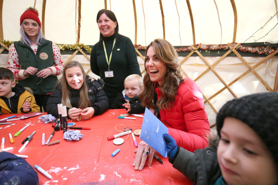 GREAT MISSENDEN, ENGLAND - DECEMBER 04: Catherine, Duchess of Cambridge takes part in Christmas activities with families and children who are supported by the Family Action charity during a visit to Peterley Manor Farm in Buckinghamshire on December 4, 2019 in Great Missenden, England. (Photo by Jonathan Brady - WPA Pool/Getty Images)