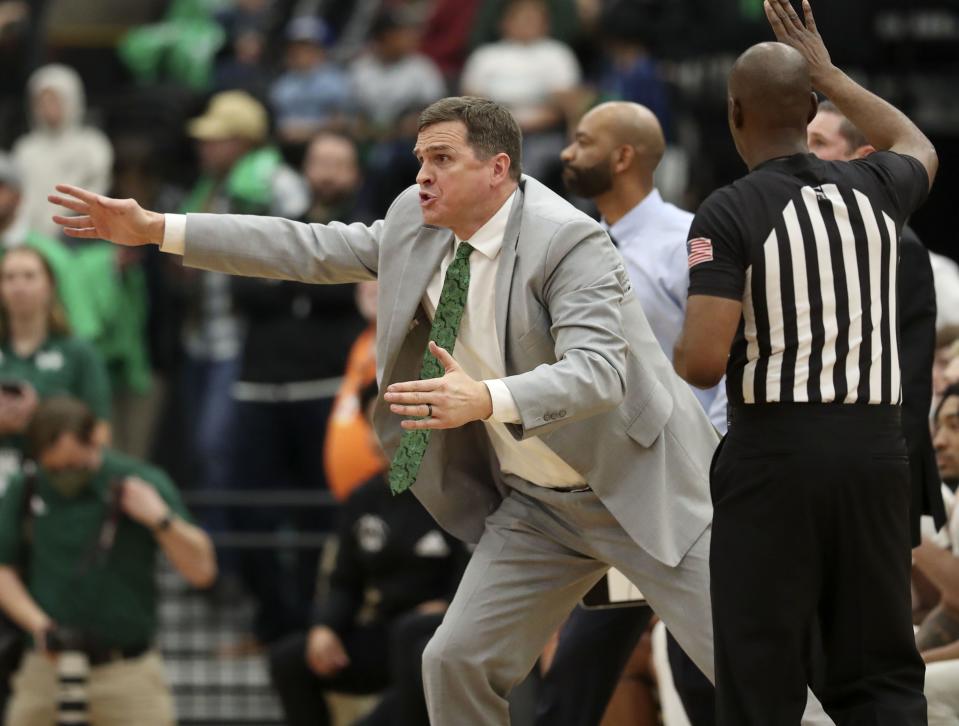 Utah Valley University coach Mark Madsen directs his players during a game on Dec. 1, 2021.