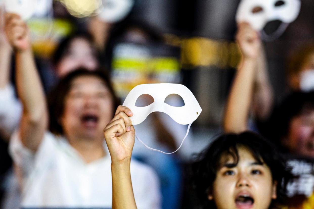 <span>Activists protesting against deepfake porn in Seoul on 30 August.</span><span>Photograph: Anthony Wallace/AFP/Getty Images</span>