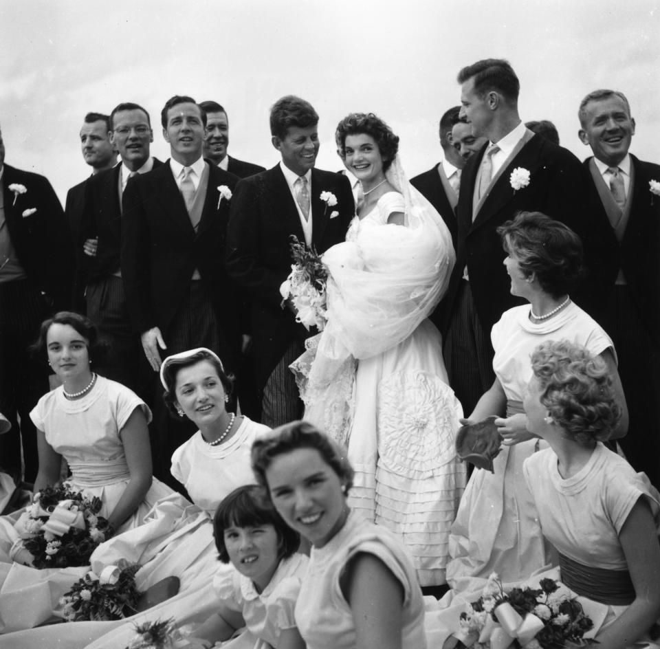 12th September 1953: John Kennedy (1917 -1963) and Jacqueline Bouvier (1929 - 1994) pose with their ushers and maids of honor on their wedding day, Newport, Rhode Island. (Photo by MPI/Getty Images)