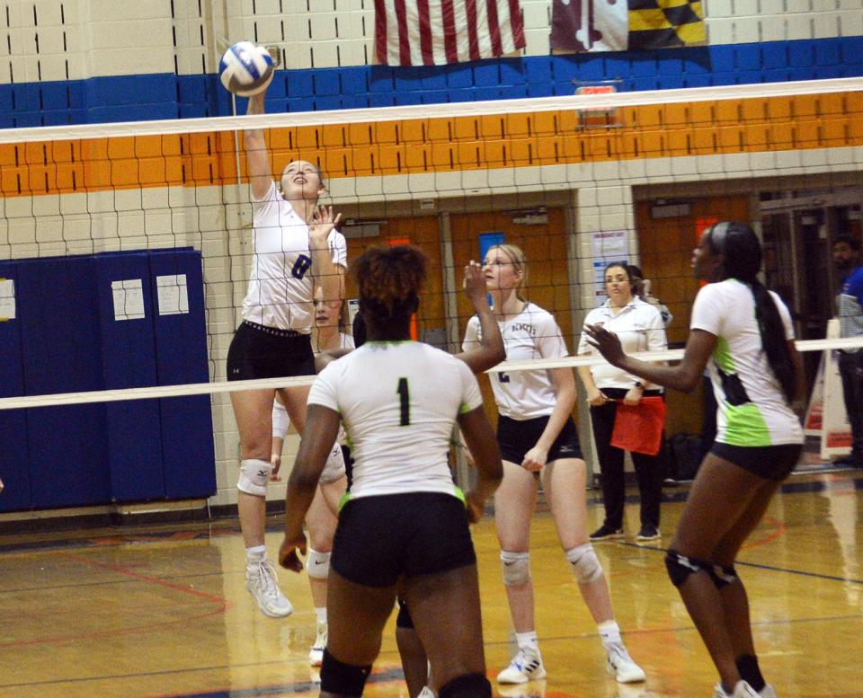 Clear Spring's Ella Papa hits a kill attempt during the Blazers' sweep of Forest Park in the Maryland Class 1A volleyball semifinals at Watkins Mill on Nov. 14, 2022.