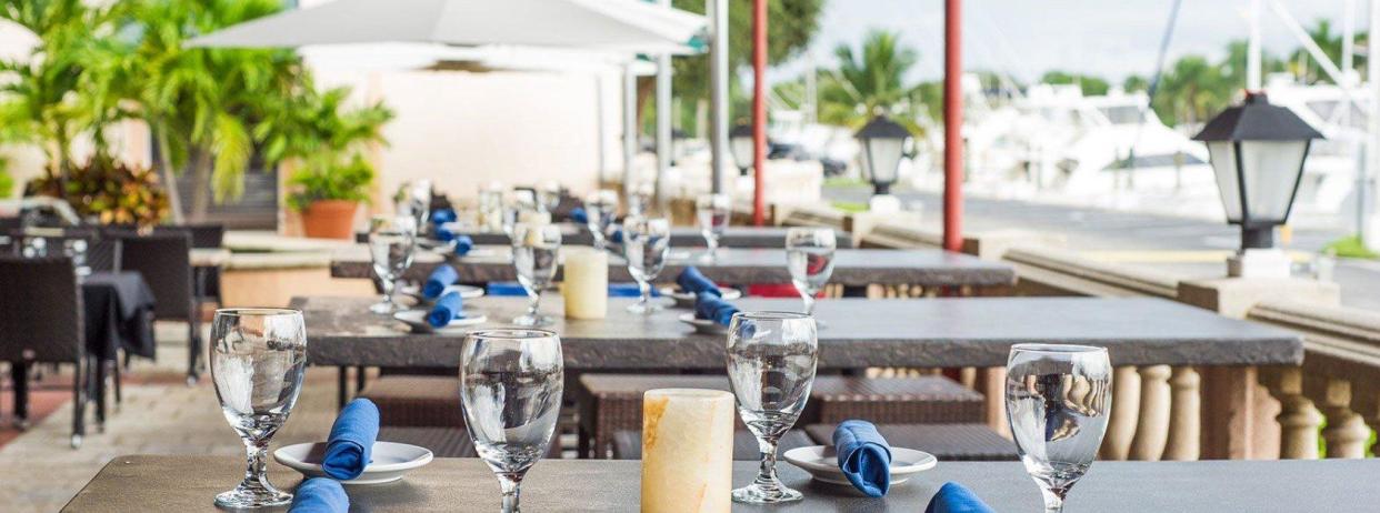 The outdoor patio behind the new FireFin Grill overlooks the Soverel Harbour Marina in Palm Beach Gardens.
