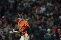 San Francisco Giants' Tyler Fitzgerald walks to the dugout after striking out during the fifth inning of the team's baseball game against the Pittsburgh Pirates, Friday, April 26, 2024, in San Francisco. (AP Photo/Godofredo A. Vásquez)