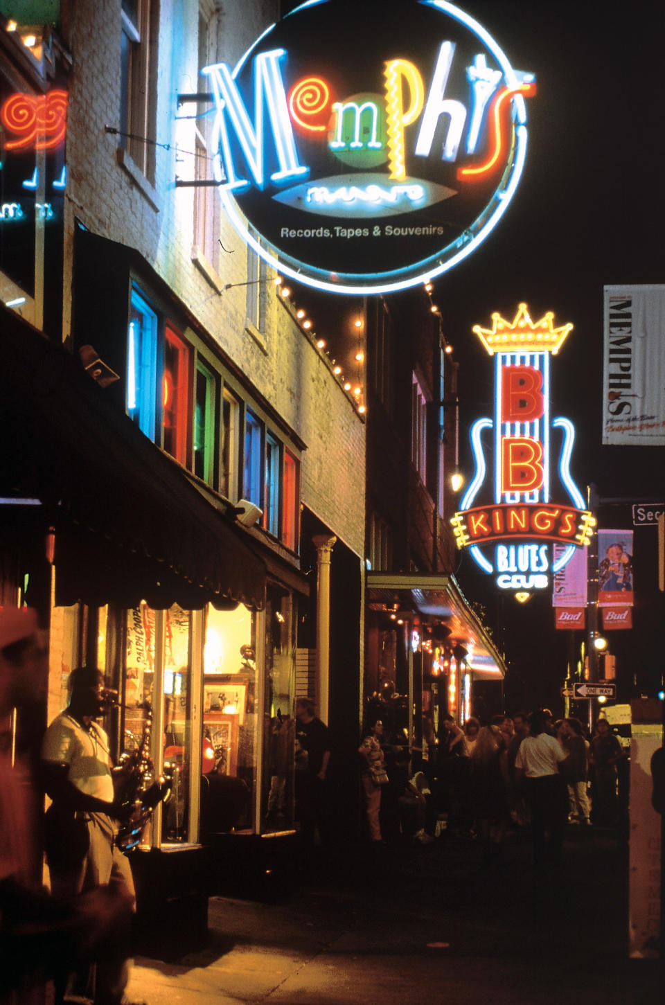 FILE - In this undated file photo provided by the Memphis Convention & Visitors Bureau shows Beale Street in Memphis at night. A stroll along Beale Street, home to blues bars, barbecue restaurants, gift shops and dance clubs with a long history of influencing American music, is one of the top tourist attractions in Memphis. (AP Photo/Memphis Convention & Visitors Bureau, file)