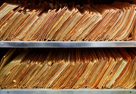 A shelf containing documents of the former East German Ministry for State Security (MfS), known as the Stasi, is pictured at the central archives office in Berlin, Germany, March 12, 2019. Picture taken March 12, 2019. REUTERS/Fabrizio Bensch