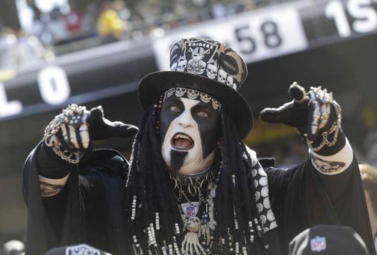 An Oakland Raiders fan cheers before a game against the Atlanta Falcons. (AP Photo/Marcio Jose Sanchez)