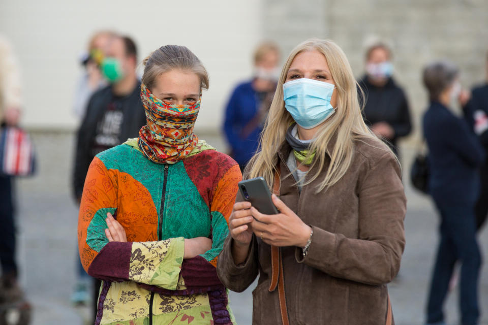 ZGORZELEC, POLAND - 2020/04/24: Women wear face masks as they take part during the demonstration. Hundreds of polish-Germany border residents protest against anti-virus measures as they block them from commuting to work on a daily basis. In response to the COVID-19 pandemic, both countries are requiring those entering to undergo a 14day quarantine period, though Germany makes an exception for cross border commuters, Poland does not. (Photo by Karol Serewis/SOPA Images/LightRocket via Getty Images)