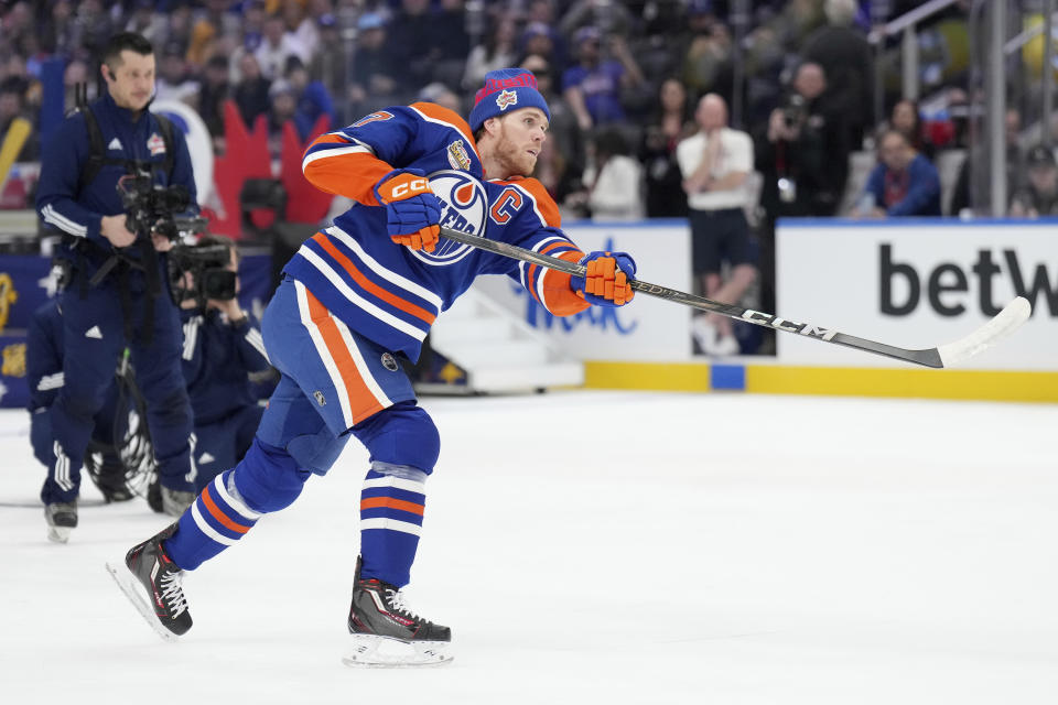 Edmonton Oilers' Connor McDavid takes part in the NHL All-Star hockey skills competition's shooting accuracy section, in Toronto, Friday, Feb. 2, 2024. (Nathan Denette/The Canadian Press via AP)