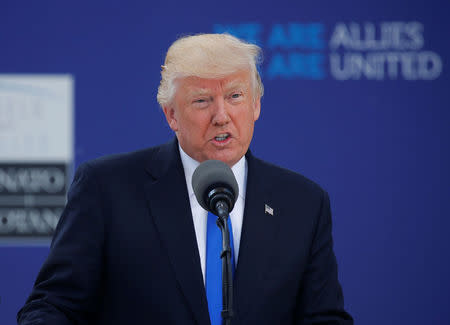 U.S. President Donald Trump speaks at the start of the NATO summit at their new headquarters in Brussels, Belgium, May 25, 2017. REUTERS/Jonathan Ernst