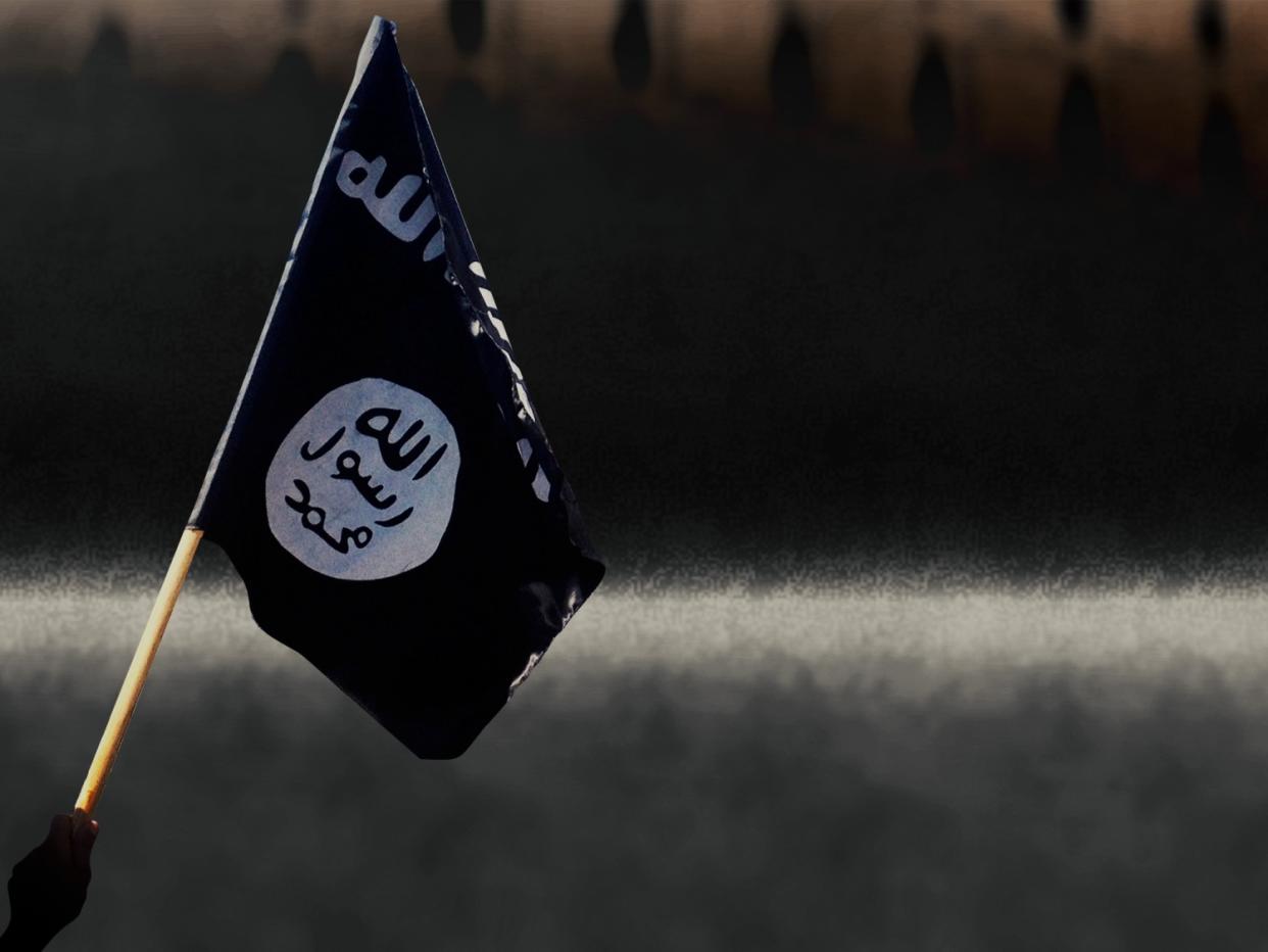 Man waves black flag used by Islamic State of Iraq and the Levant insurgents, Mosul, Iraq, on texture, partial graphic