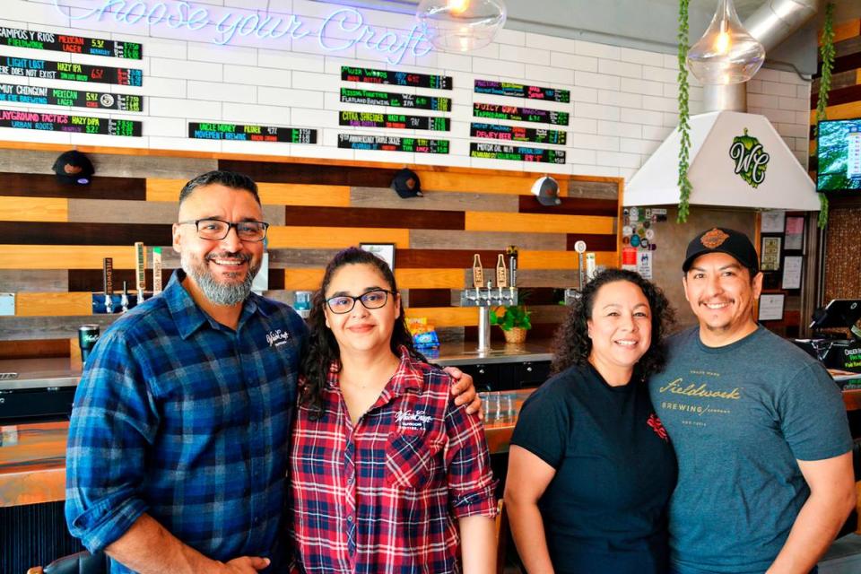 WhichCraft, a new craft brew taproom, has opened in downtown Gustine, California. Co-owners and married couples (L-R) Sam and Jackie De La Cruz and Lizett and Joe Garcia on May 19, 2023.