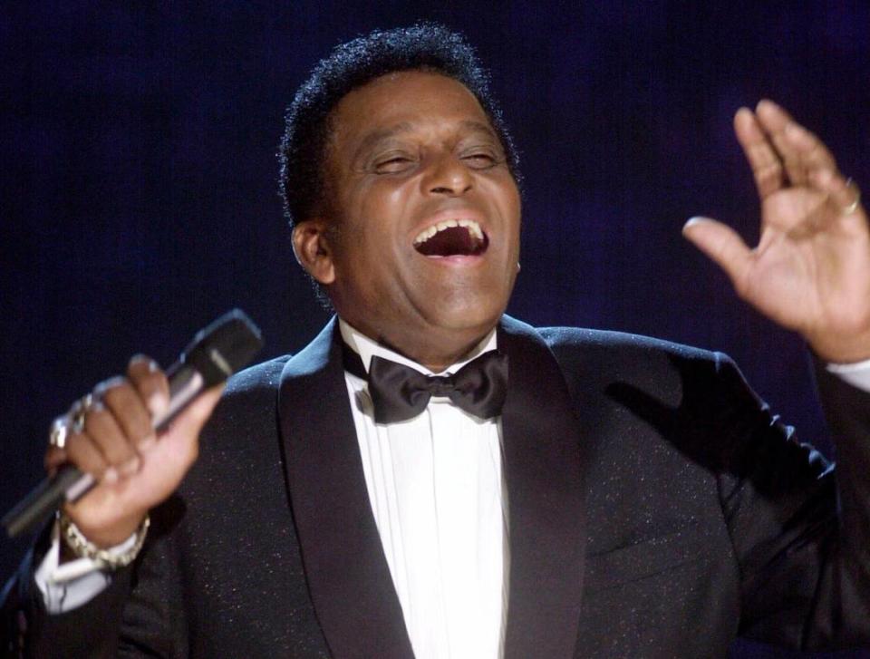 Charley Pride performs during his October 2000 induction into the Country Music Hall of Fame at the Country Music Association Awards show at the Grand Ole Opry House in Nashville. Pride, 86, died Dec. 12, 2020, in Dallas of complications from COVID-19.