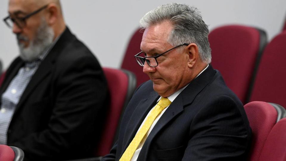 Jon Mast, CEO of the Manatee-Sarasota Building Industry Association, sits in the audience during the Board of Commissioners meeting on April 25, 2023.