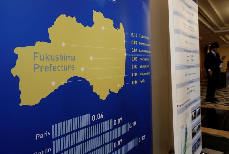 Banners promoting safety about radiation from the Fukushima nuclear plant are displayed at a press center of G20 Foreign Ministers meeting in Nagoya