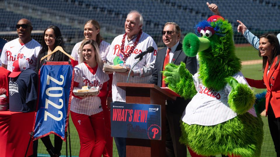 Former Phillies Manager Charlie Manuel, center, holds an Uncle Charlie's steak during an event to highlight what is new for the 2023 Philadelphia Phillies season at Citizens Bank Park in Philadelphia on Monday, April 3, 2023.