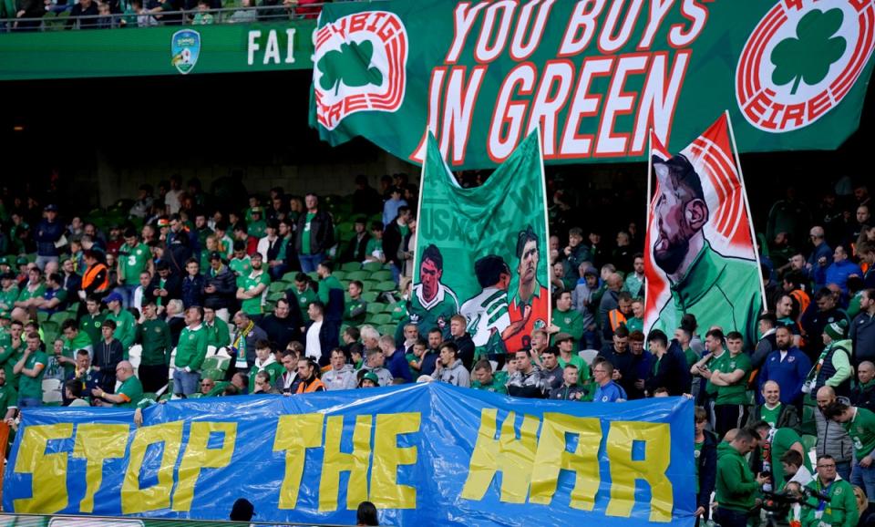 Republic of Ireland fans held up a banner in support of Ukraine (Niall Carson/PA) (PA Wire)