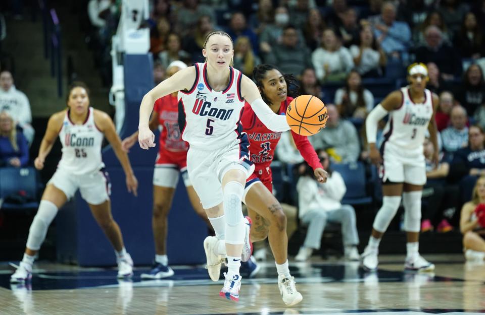 UConn Huskies guard Paige Bueckers (5) returns the ball against the Jackson State Lady Tigers in the first half at Harry A. Gampel Pavilion.