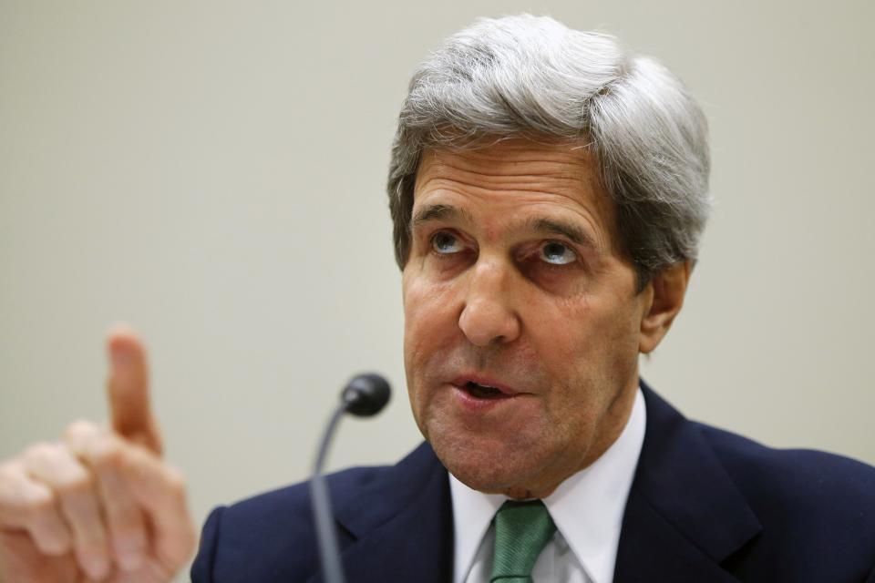 Kerry gestures as he testifies on agreements over Iran's nuclear programs, before the House Foreign Affairs Committee on Capitol Hill in Washington